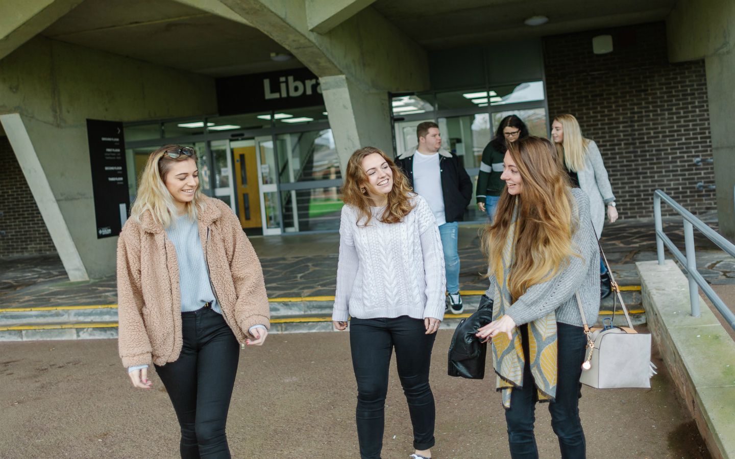 A group of students outside Marjon library