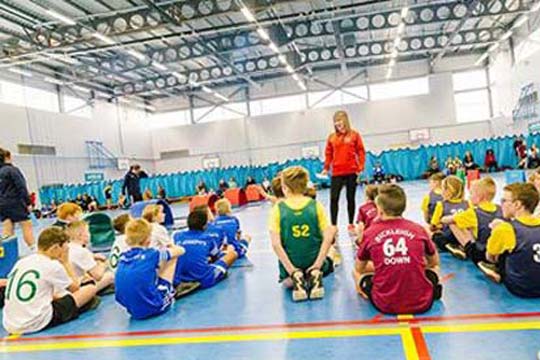 Sports development student leads a sports event for local primary schools