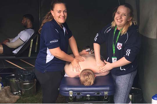 Sport rehabilitation students provide rehab treatments to soldiers at a military event