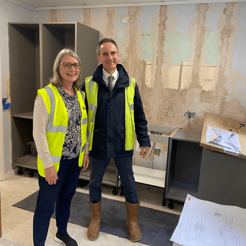 Vice Chancellor Professor Claire Taylor alongside Project Manager Peter Kay in the Dix Hall.