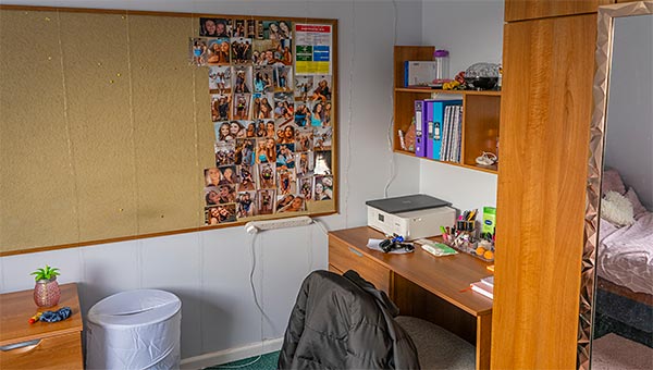Desk and noticeboard in every bedroom
